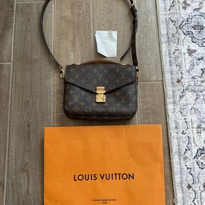 100% authentic Louis Vuitton Pochette Métis with original receipt